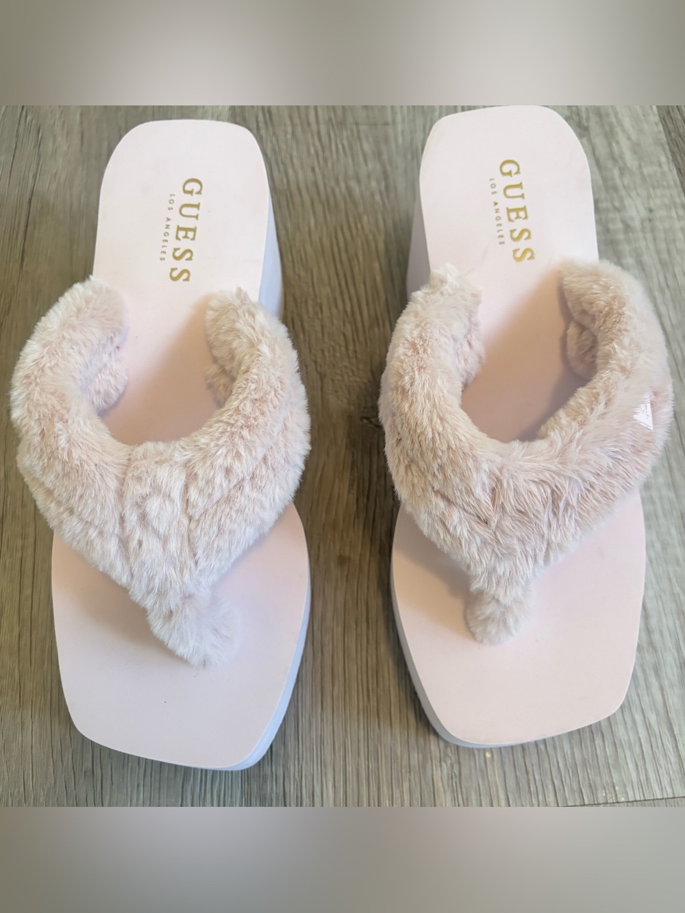 GUESS Sabinn Faux Fur Wedge Sandals in pink. Size 7